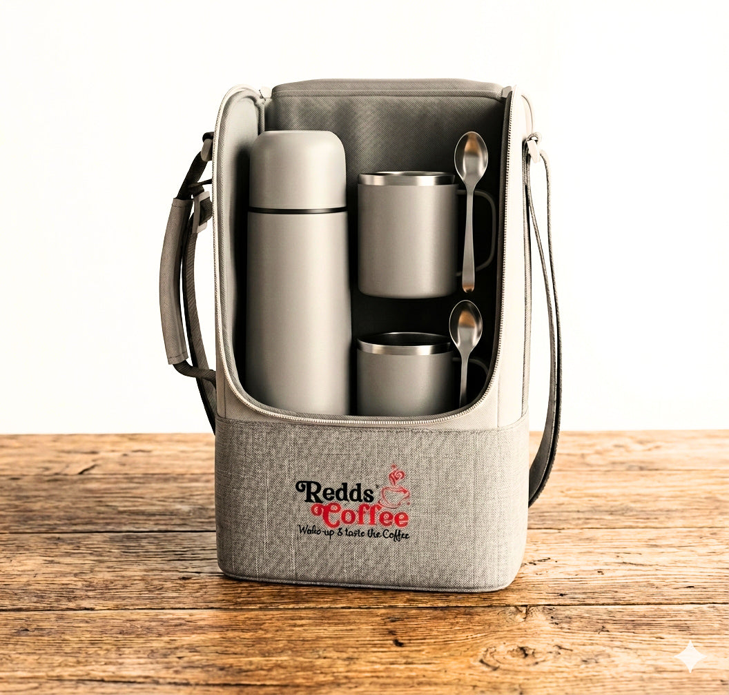 Coffee thermos, stainless steel cups, and spoons in a gray carrying case. Front side.